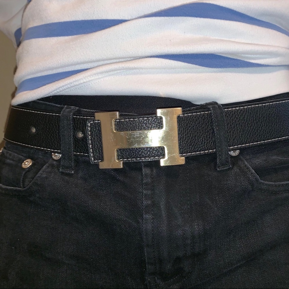 Black and gold Hermès belt.